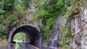 tunnel through the mountain at the entrance to cades cove in pigeon forge, tn